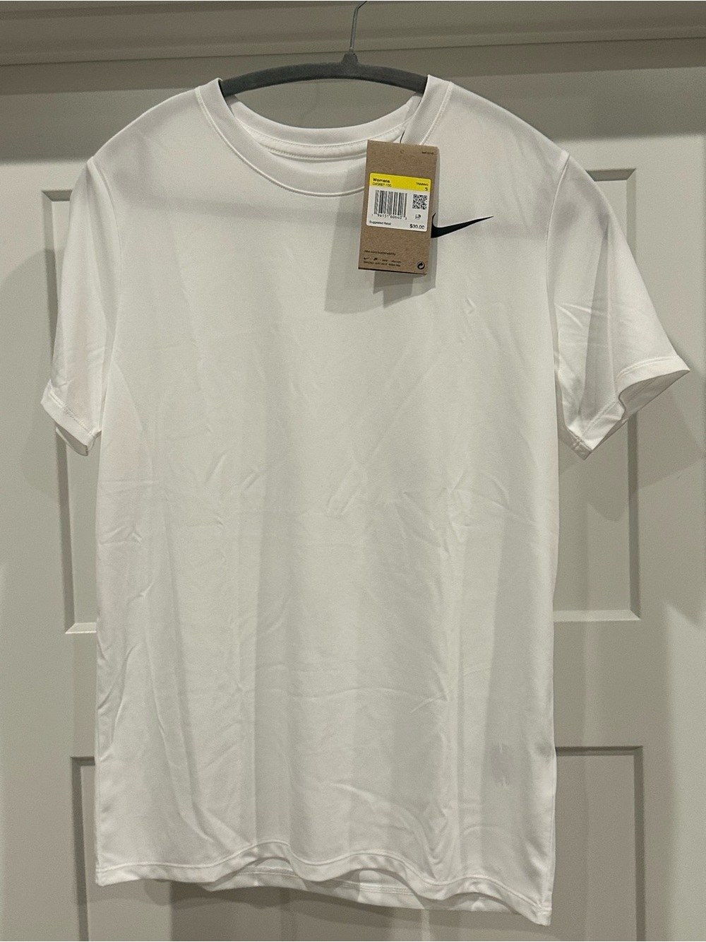 Nike White Short-Sleeve Performance Tee with Black Swoosh